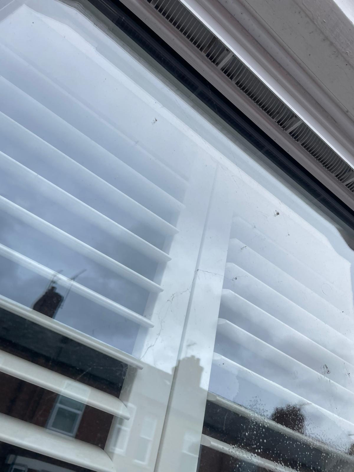 Dirty window with marks on glass — before clean